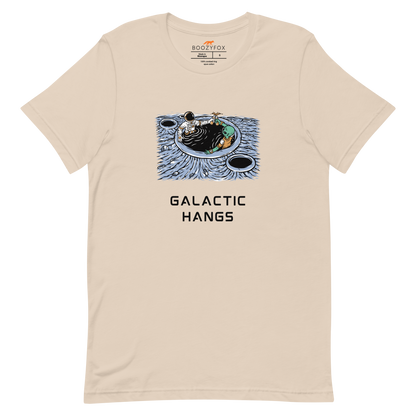 Soft Cream Premium Galactic Hangs Tee featuring an out-of-this-world graphic of an Astronaut and Alien Chilling Together - Funny Graphic Space Tees - Boozy Fox