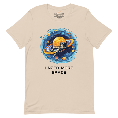 Soft Cream Premium Astronaut Tee featuring a captivating I Need More Space graphic on the chest - Funny Graphic Space Tees - Boozy Fox