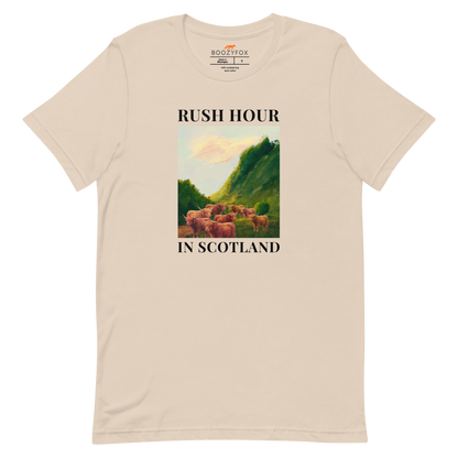 Funny Highland Cow Rush Hour in Scotland lightweight graphic tee in soft cream by Boozy Fox