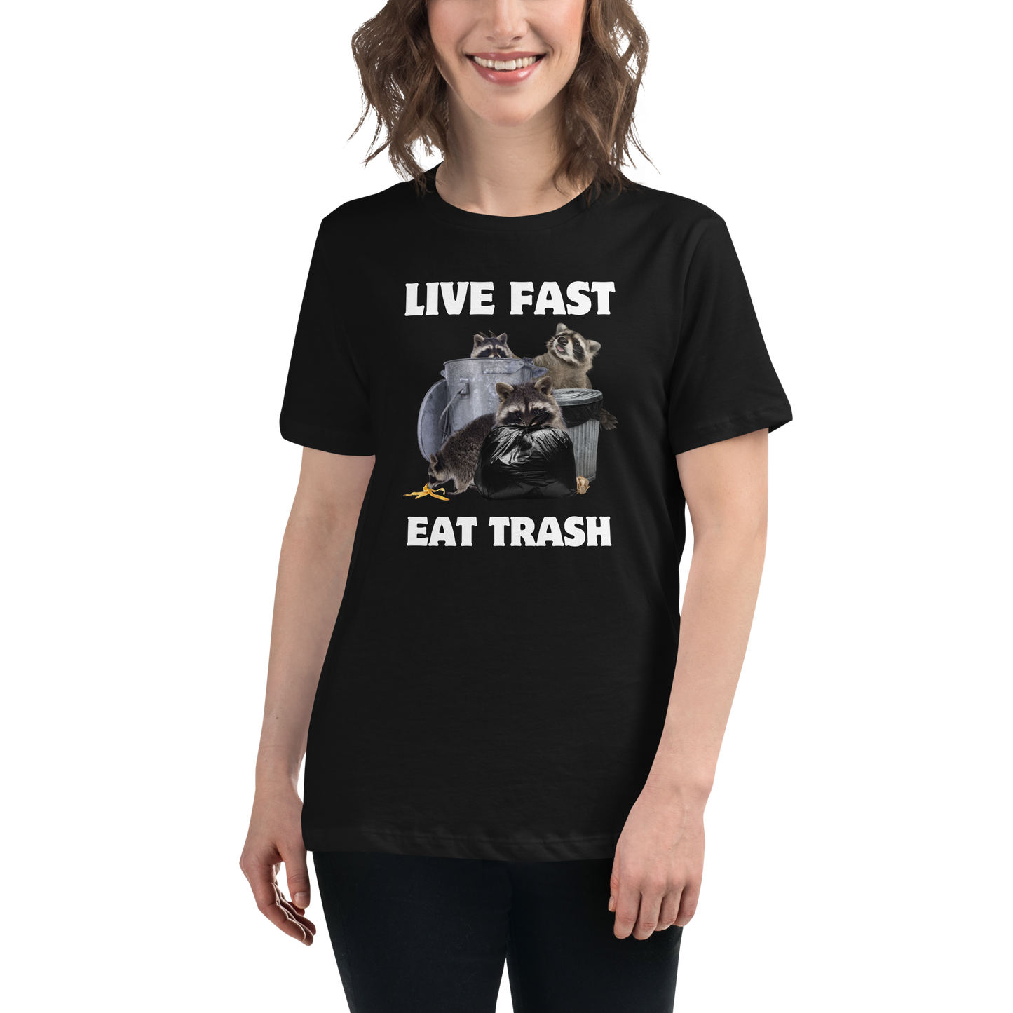 Smiling woman wearing a Women's Black Raccoon T-Shirt featuring a hilarious Live Fast Eat Trash graphic on the chest - Women's Funny Graphic Raccoon Tees - Boozy Fox