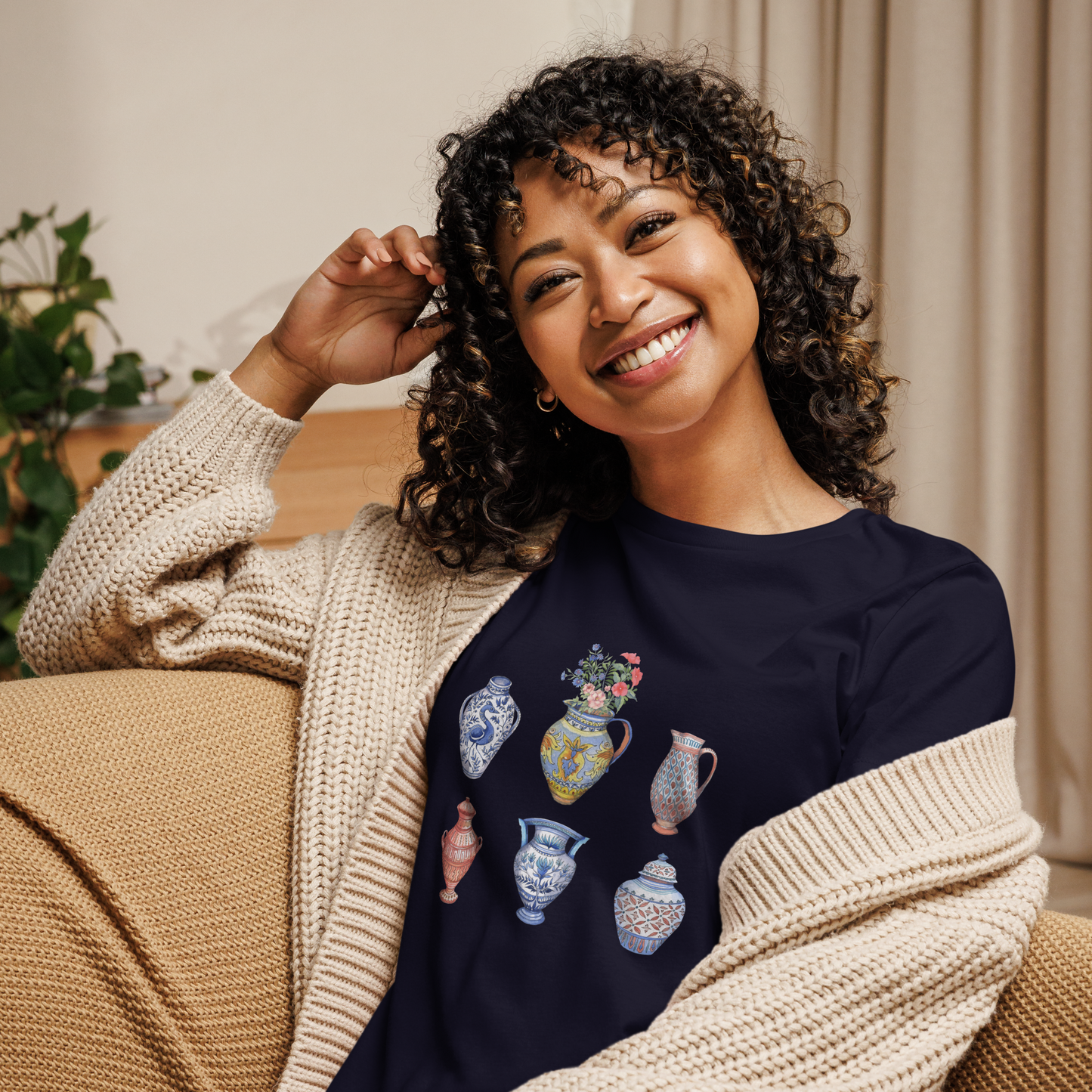 Smiling woman wearing a relaxed navy Vase t-shirt featuring a chic vase graphic on the chest - Women's Artsy Graphic Vase Tees - Boozy Fox