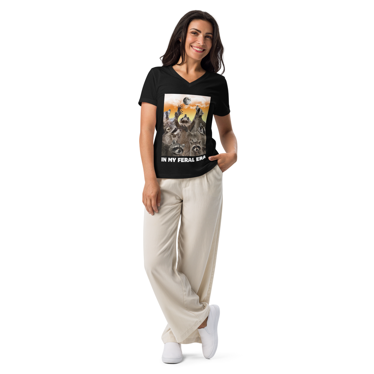 Woman wearing a Funny In My Feral Era Raccoon women's graphic v-neck t-shirt in black by Boozy Fox