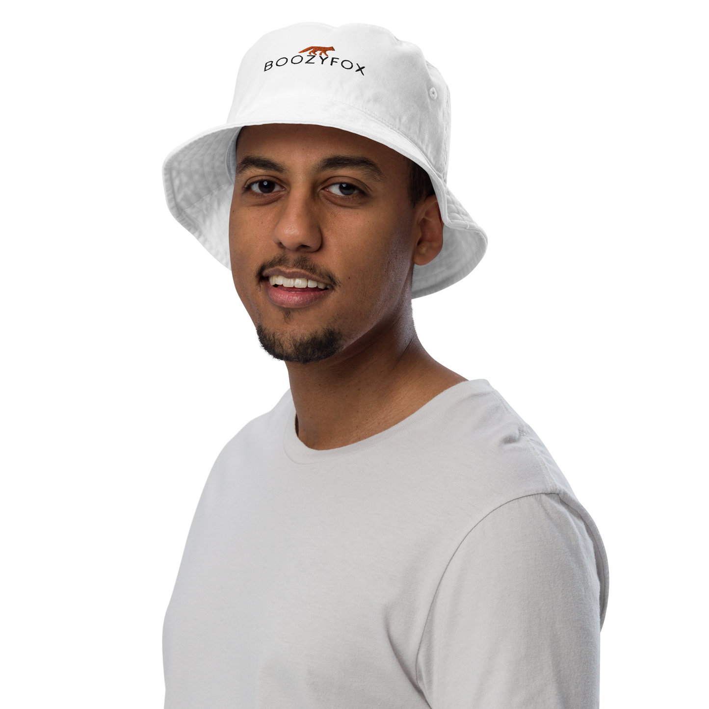 Man wearing a White Organic Bucket Hat featuring a recognizable Boozy Fox embroidery logo on the front - Bucket Hats - Boozy Fox