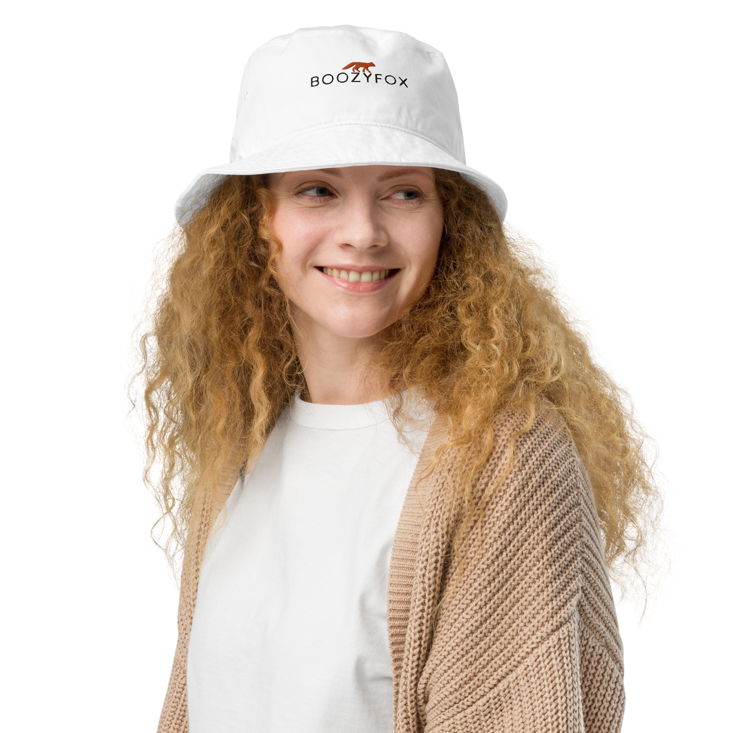 Smiling woman wearing a White Organic Bucket Hat featuring a recognizable Boozy Fox embroidery logo on the front - Bucket Hats - Boozy Fox
