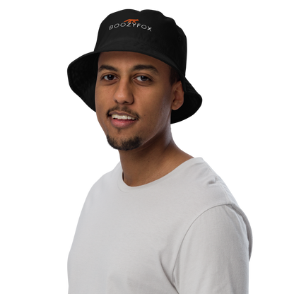 Man wearing a Black Organic Bucket Hat featuring a recognizable Boozy Fox embroidery logo on the front - Bucket Hats - Boozy Fox