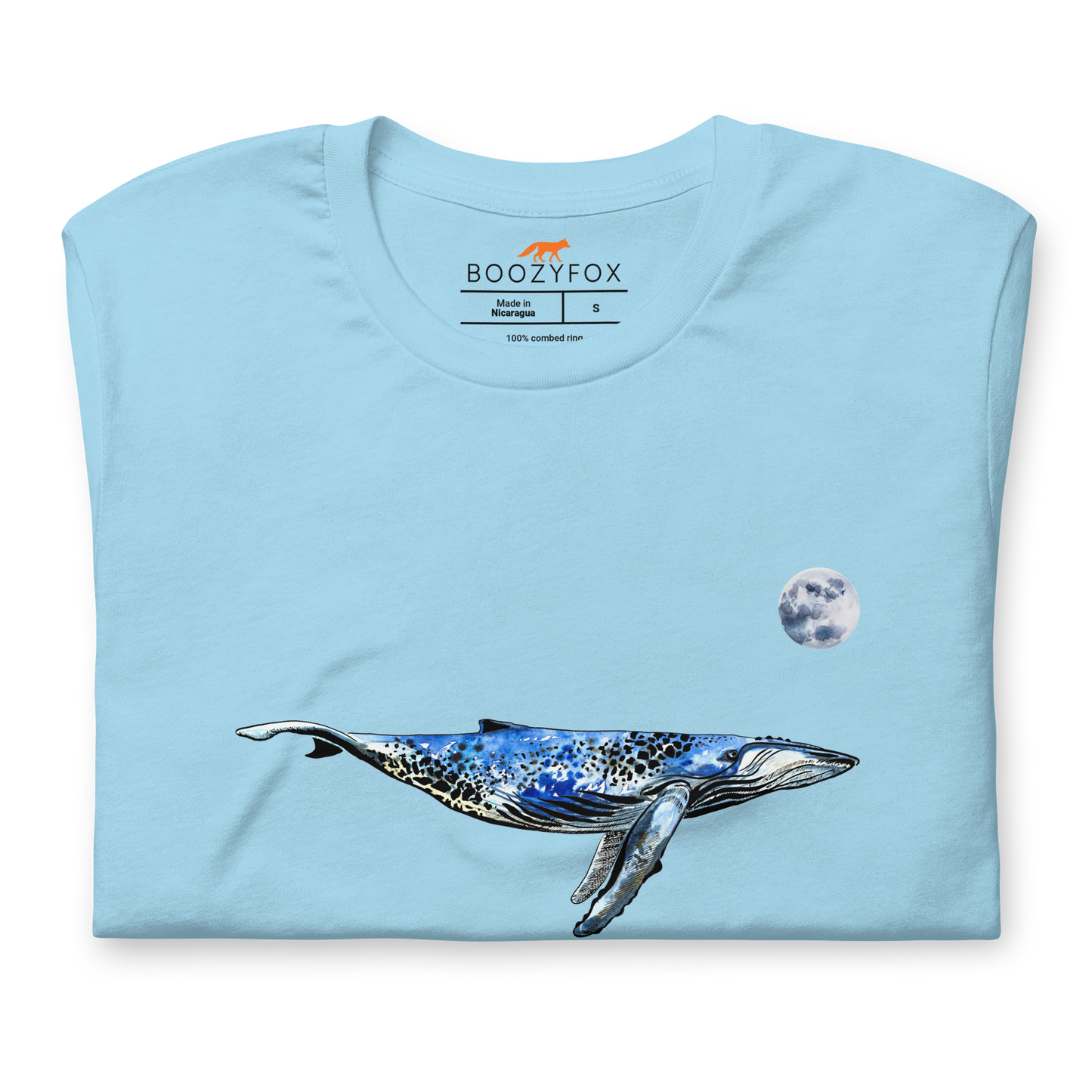 Front Details of a Ocean Blue Premium Whale T-Shirt featuring majestic Whale Under The Moon graphic on the chest - Cool Graphic Whale Tees - Boozy Fox