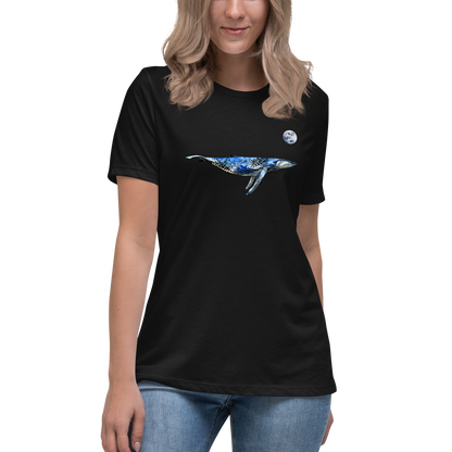 Young Woman Wearing a Women's relaxed black whale t-shirt featuring a majestic Whale Under The Moon graphic on the chest - Women's Graphic Whale Tees - Boozy Fox